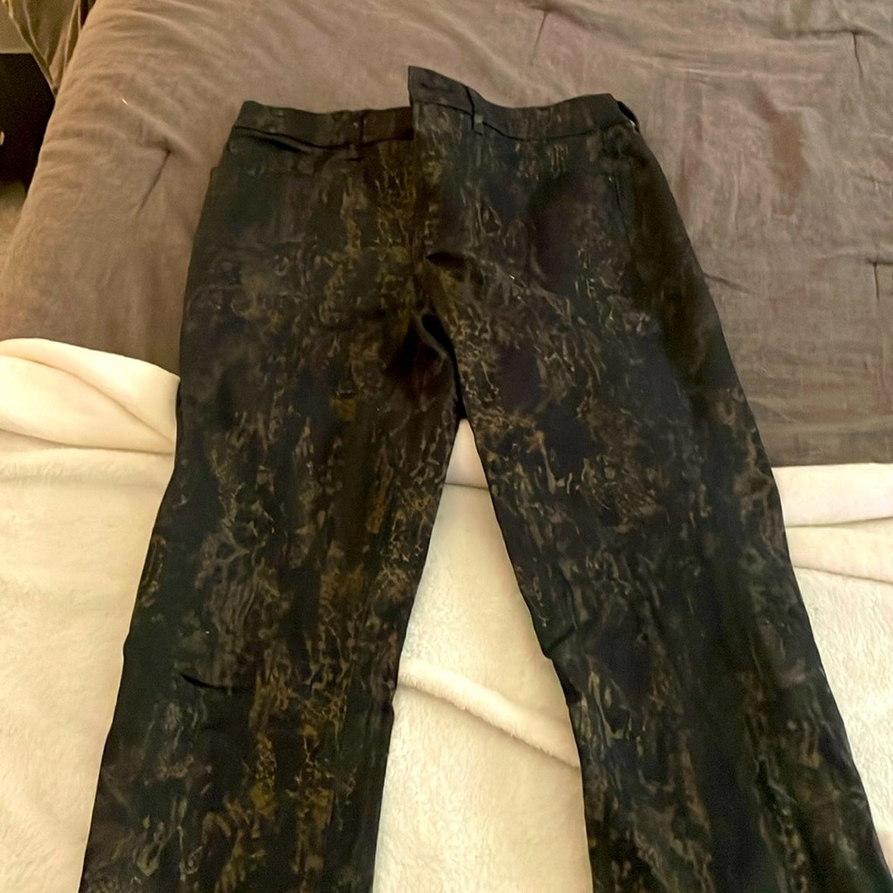 Express black jeans with gold snake skin detail. Size 4